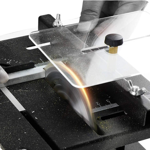 Close-up of Mini Desktop Table Saw 150W With Adjustable Speed For Diy Wood Plastic And Acrylic Cutting 35mm Cutting Depth in action