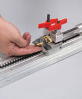 Hand demonstrating the adjustable sled and handle on Pen Press XL For Assembly And Disassembly, suitable for pen making projects.