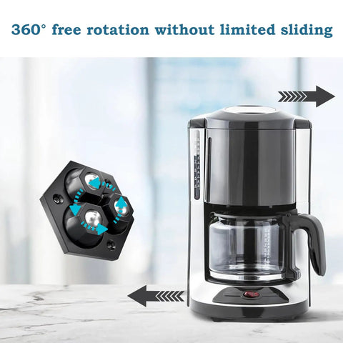 Eight Pack Countertop Appliance Sliders With Self Adhesive Rollers For Coffee Makers Air Fryers Stand Mixers And Blenders 360 Degree Rotating Mini Sticky Wheels With Stainless Steel Balls Black shown under a coffee maker demonstrating 360° rotation.