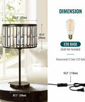 Sleek 21.6 Inch Black Industrial Bedside Lamp With Crystal K9 Shade, dimensions shown, on round table in living room.