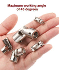 Hand holding Beefy Four Piece 5mm To 5mm Universal Joint Shaft Couplings, Metal 45 Degree Rotatable U Joints for RC