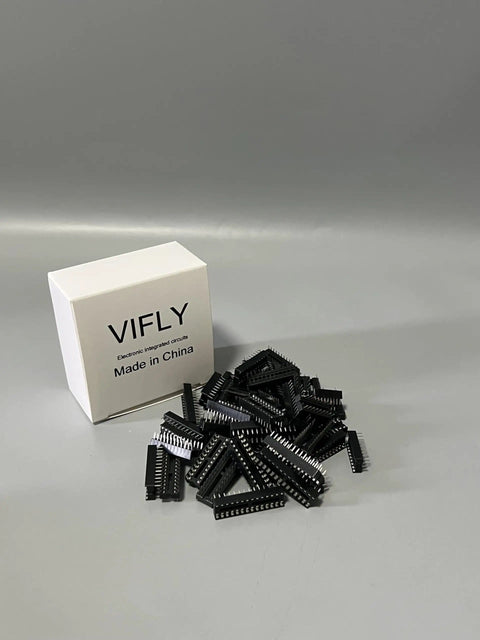 Eight Piece IC Chip Kit For Electronics Projects Including Op Amp ICs And Timers With LM324 LM358 LM386 LM393 UA741 NE5532 NE555 PC817 Optical Isolator next to white box