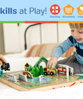Child playing with Portable Wooden Railroad Tabletop Playset With Magnetic Train Cars And Animal Scenery For Toddlers And Preschoolers Age Three Plus Legit Awesome Travel Kit.