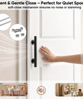 Image showing Zero Hassle Concealed Barn Door With Butter Smooth Soft Close Glide and two panel raised arch design in use.
