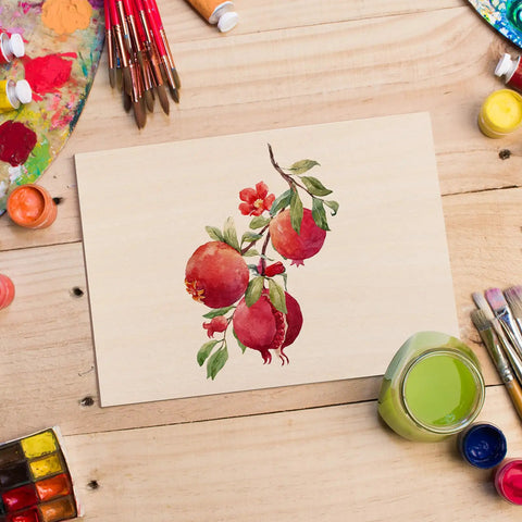 Artistic pomegranate illustration on Pro Level Basswood Sheets 24 Pack 4X6X1/16 Inch Unfinished Wood for laser cutting.