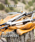 Center Drive Multitool with 12 Piece Bit Set outboard knife pliers, pry bar visible, resting on gloves outdoors.