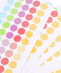 Heavy Duty Hole Punch Reinforcement Stickers Six Sheets For Loose Leaf Paper Fixes That Patch Broken Ring Bindings And Keep Your Class Notes Intact With No Sweat This Semester, showing colorful decorative designs.
