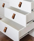 White drawers with 8 Pieces Leather Drawer Pulls Set With Brushed Gold Knobs For Cabinets And Furniture Dark Brown, installed.