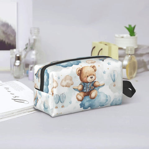 Travel Toiletry Organizer Bag For Women And Men, Waterproof Dopp Kit with teddy bear design on a cloud, ideal for cosmetics.