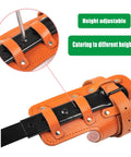 Close-up of Pro Grade Tree Climbing Spikes Set with adjustable leather straps highlighting adjustment features.