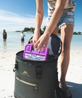Heavy Duty X Large Reusable Ice Pack Weighs Five Pounds Ultra Cold Freezing Formula being placed in a cooler at the beach.