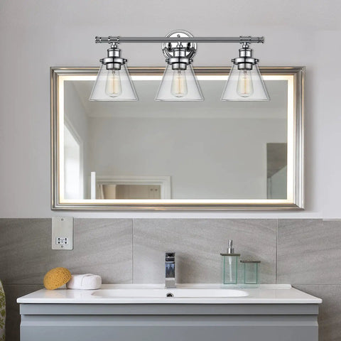 Parker 3-Light Vanity Light In Chrome With Clear Glass Shades above bathroom mirror, bulb not included, 24.63W x 11H x 7.92D