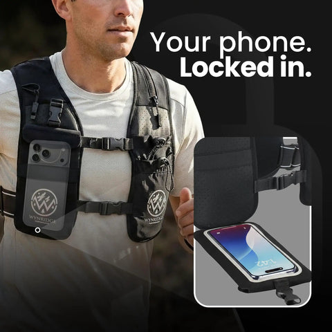 Hydration Running Vest With 8 Pockets And 17 Oz Flask For Men And Women, showing secure phone holder in use, black color.