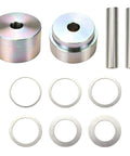 Solid Coin Ring Center Punch Kit With Six Interchangeable Spacer Rings Fits Silver Quarters Golden Dollars And Flat Metal Blanks, includes two metal punches and six spacer rings.