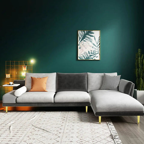 Adjustable Gold Furniture Legs For Desks, Cabinets, Beds And Couches, 12.5 Cm 5 In High, visible on a modern grey couch in a stylish room.
