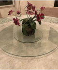 Large 36 Inch Tempered Glass Lazy Susan Turntable With Silent Smooth 360 Rotation Heat Resistant Serving Tray with flowers.