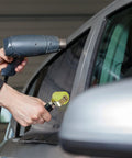 Car sound deadener rolling wheel roller with yellow wheel and metal arm, side-view used on car window