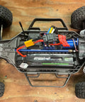 RC car chassis with 3S LiPo Battery 11.1V 5200mAh 120C With XT60 And TRX Plugs, visible wiring and suspension