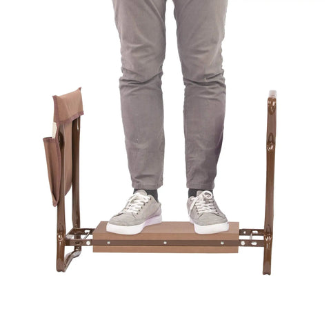Person standing on 2 In 1 Garden Kneeler And Bench Folding Stool With Tool Pouches And Soft EVA Foam Cushions, durable brown frame