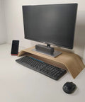 USB Computer Speaker Bar With Stereo Sound And Enhanced Bass, Portable Mini Sound Bar on a desk under monitor