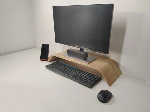 USB Computer Speaker Bar With Stereo Sound And Enhanced Bass, Portable Mini Sound Bar on a desk under monitor