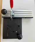 528 Small Coping Sled For Router Tables Safe Coping Cuts With Ultra Track Fence Fits Up To 6 Inch Wide Stock And 1 3 4 Inch Thick Two Adjustable Feed Handles That Keep Your Hands Clear Works In Miter Slot Or Against Fence Made In USA - top view with red handle and black base
