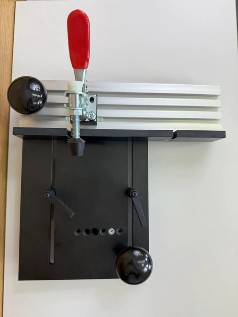 528 Small Coping Sled For Router Tables Safe Coping Cuts With Ultra Track Fence Fits Up To 6 Inch Wide Stock And 1 3 4 Inch Thick Two Adjustable Feed Handles That Keep Your Hands Clear Works In Miter Slot Or Against Fence Made In USA - top view with red handle and black base
