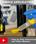 Person using DOT 5.1 Hydraulic Brake Fluid syringe on bike disc brake system