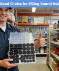 Man holding 125 Pieces Black Rubber Round Hole Plugs Set In Eight Sizes Silicone Plugs For Round Holes For Furniture in store