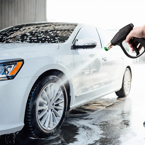 Pressure Washer Short Gun Foam Cannon Kit With One Quarter Inch Quick Connector And Five Nozzle Tips M22 To Fourteen Millimeter Inlet Adapter Up To Two Thousand PSI For Cars Driveways And Patios being used to wash a car.