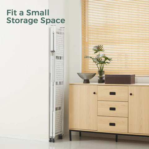 Five Shelf Folding Bookshelf With Wheels For Easy Go Anywhere Setup No Fuss Heavy Duty Freestanding Metal Wire Storage Rack For Living Room Office Kitchen Basement Pantry In White, folded beside cabinet