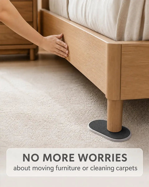 Big Time Heavy Duty Furniture Sliders 16 Piece Set Large Oval Floor Glide Pads placed under a bed leg on carpet.