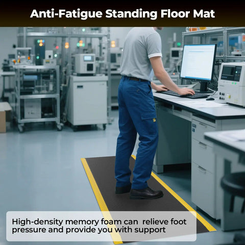 Person standing on an ergonomic anti fatigue mat for workshop 84 by 35 inches cushioned memory foam floor mat in an industrial setting.