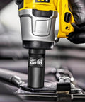 Half Inch Female To Three Eighths Inch Male Impact Socket Adapter on impact wrench, chrome molybdenum, installed on engine bolt