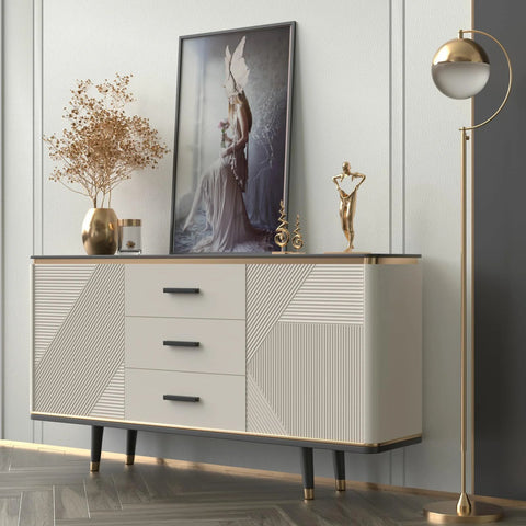 Modern sideboard with adjustable black cabinet pulls, abstract art, gold lamp, and decor in living room setting.