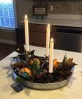 Battery Operated Flameless Taper Candles With Remote And Timer on a decorative tray in a kitchen setting