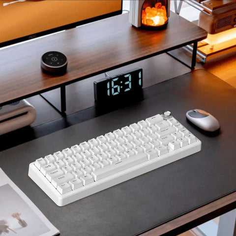 Slick 60 Percent Wired Mechanical Gaming Keyboard With RGB Backlight And Hot Swappable Gasket Mount Featuring Pre Lubed Linear Blueberry Switches And Aluminum Volume Knob For A Top Shelf Typing Setup In Clean White on a modern desk.
