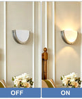 Lifora Hay 2-Light Indoor Wall Sconce 16 inch, Half Moon Wall Light Fixture displayed on a wall, both off and on settings.