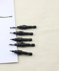 Five Piece Hex Shank Countersink Drill Bit Set With Titanium Coated High Speed Steel Twist Bits displayed on fabric surface.