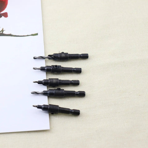Five Piece Hex Shank Countersink Drill Bit Set With Titanium Coated High Speed Steel Twist Bits displayed on fabric surface.