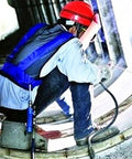 Khbyt Tube Cooling Vest Accessory With Integrated Belt And Connector For Industrial Work Environments worn during welding tasks.