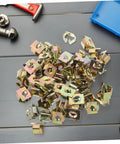 Heavy Duty 50 Pack Golden Iron Captive Nut Car Body Clips Street Tough Bumper Retainers And License Plate Fasteners built for rough terrain, showing gold-coated clips.