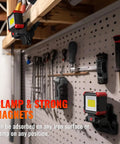 Rechargeable LED Work Light With Clamp And Magnetic Clip 2100 Lumen COB Portable Work Light on pegboard in workshop