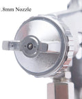 Close-up of 1.8mm nozzle on Heavy Duty Siphon Feed Spray Gun With 1.8Mm Nozzle For Straight Up Flawless Oil Based Or Latex Paint Jobs Featuring Fine Tune Controls And Quick Wipe Clean Cup.