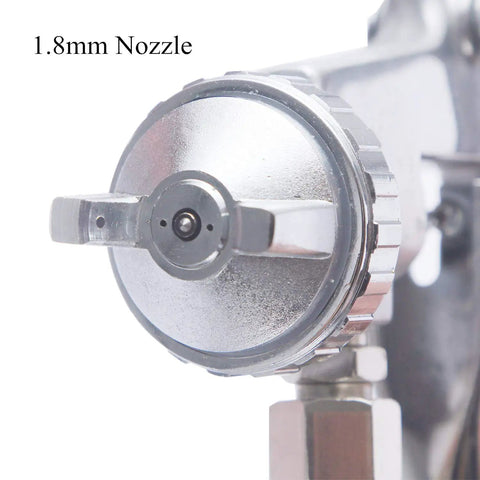 Close-up of 1.8mm nozzle on Heavy Duty Siphon Feed Spray Gun With 1.8Mm Nozzle For Straight Up Flawless Oil Based Or Latex Paint Jobs Featuring Fine Tune Controls And Quick Wipe Clean Cup.
