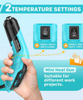 Person holding Powerful Mini Heat Gun With Dual Temps 554 F And 896 F 350W Hot Air Tool for crafts, showing temperature settings.