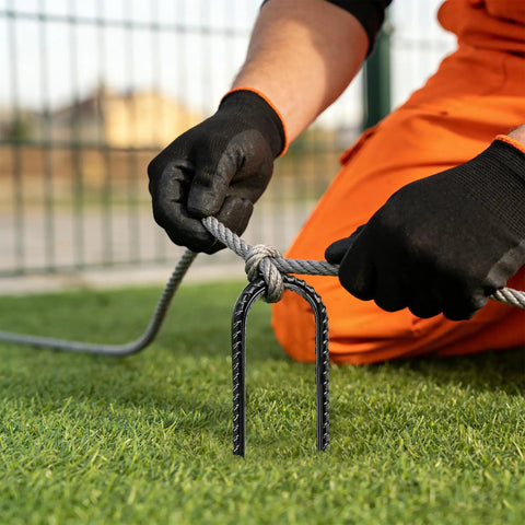 Securing rope with Beefy 8 Inch U Shaped Ground Anchor Stake, galvanized rebar, outdoors on grass, 10 pack heavy duty stakes