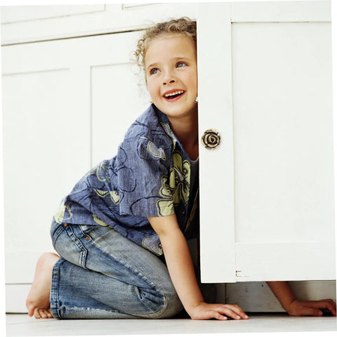Child looking out from a cabinet with Two Pack Vintage Rose Flower Cabinet Knobs For Kitchen Cabinets And Furniture Decorative Drawer Pull Handles For Dresser Cupboards Wardrobes Easy Open And Close