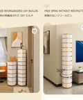 Toss Sneaker Chaos At The Door With This Sleek Rotating Shoe Rack, showcasing a vertical white and orange shoe tower in a modern entryway.