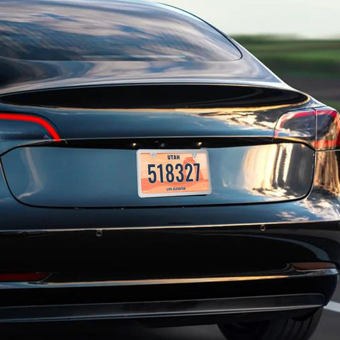 Slick Stainless Steel License Plate Frame Slim Style Two Hole Mount Polished Finish on car rear with Utah plate